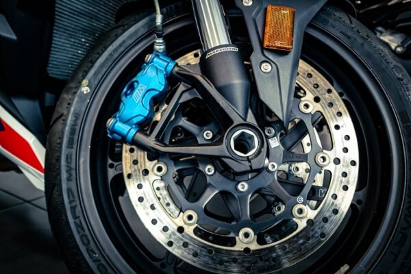 Motorcycle ABS — and the Line in the Manual That Says It Can Make You Stop Later